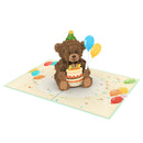 Carte pop-up Teddy avec gâteau d'anniversaire