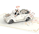Voiture de mariage avec carte pop-up couple gay
