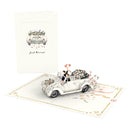Voiture de mariage avec carte pop-up couple gay
