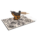 Carte pop-up machine à tatouer