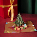 Sapin de Noël avec carte pop-up cadeaux